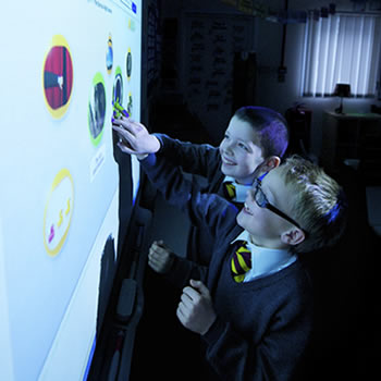 Children using whiteboard